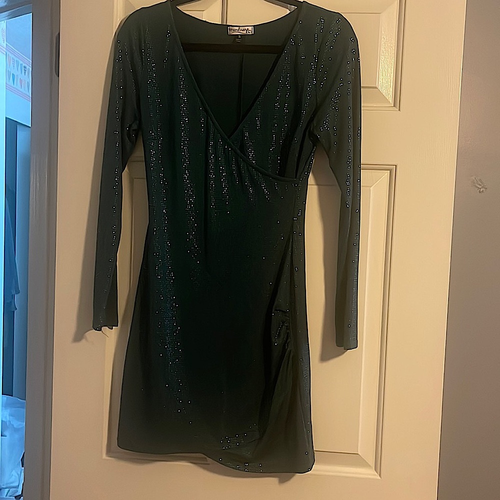 Xtraordinary long sleeve V neck sequin mini dress perfect for holidays parties